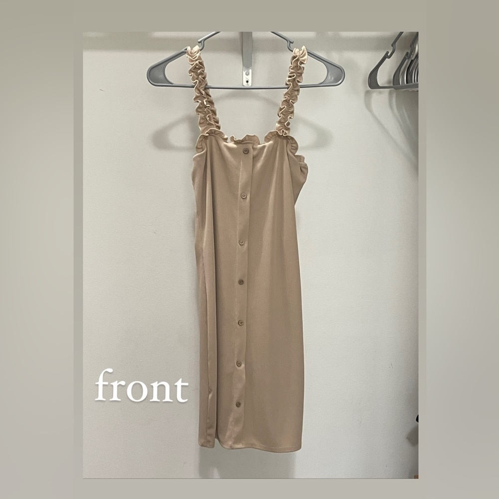 this dress is just above knee level and is more of a baggy style.